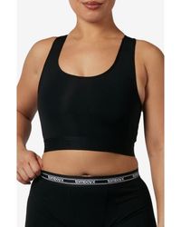 TOMBOYX - Compression Plus Racerback Crop Top - Lyst