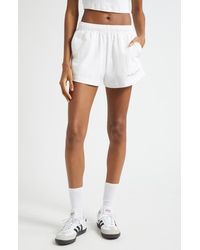 Sporty & Rich - New York Health Club Disco Graphic Cotton Sweat Shorts - Lyst