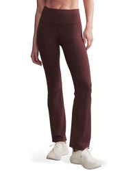 Rhone - Revive Pocket Flare Leggings - Lyst