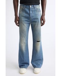 Amiri - Slash Ripped Knee Bootcut Jeans - Lyst