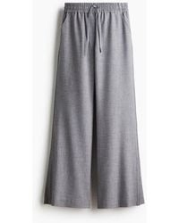 H&M - Flared Drawstring Trousers - Lyst