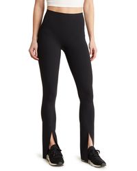 Spanx - Spanx Booty Boost Front Slit Active leggings - Lyst