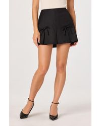 Astr - Pleated Bow Miniskirt - Lyst