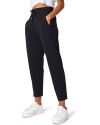 Sweaty Betty - Explorer Tapered Athletic Pants - Lyst
