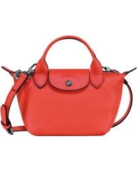 Longchamp - Extra Small Le Pliage Leather Top Handle Bag - Lyst