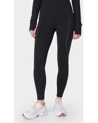 Sweaty Betty - Therma Boost Pocketed 7/8 Running Leggings - Lyst