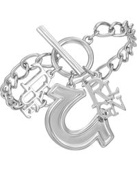 TRUE RELIGION - Horseshoe & Logo Charm Bracelet - Lyst