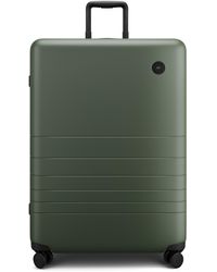 Monos 30-inch Large Check-in Spinner luggage - Green