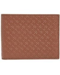 Ferragamo - Embossed Gancini Leather Bifold Wallet - Lyst
