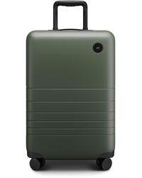 Monos 23-inch Carry-on Plus Spinner luggage - Green