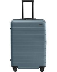 AWAY - The Medium Flex Suitcase - Lyst