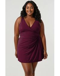 Calypsa - Plus Size Alana Wrap-Style Swim Dress With Hidden Bottoms And Adjustable Straps - Lyst