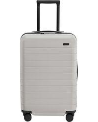 AWAY - Flex 22-Inch Bigger Spinner Carry-On - Lyst