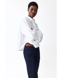 H&M - Flared High Waist Ankle Jeans - Lyst