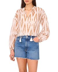 Vince Camuto - Ikat Print Split Neck Peasant Top - Lyst