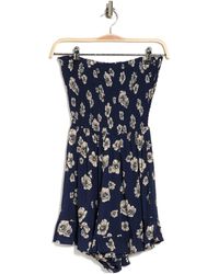 Angie Strapless Floral Print Ruffle Romper In Indigo At Nordstrom Rack - Blue