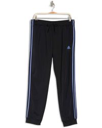 primegreen essentials warm up slim tapered 3 stripes track pants