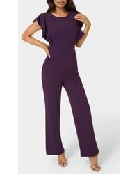 Bebe - Ruffle Scuba Jumpsuit - Lyst