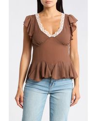 Vigoss - Ruffle Sleeve Peplum Top - Lyst