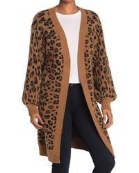 love token leopard sweater