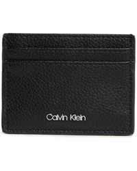 Calvin Klein Monogram Logo Zip Card Case in Brown
