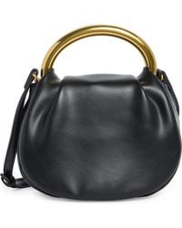BCBGMAXAZRIA - Statement Hardware Clutch - Lyst