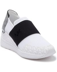 felix trainer michael kors