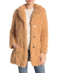 guess women's faux fur jackets