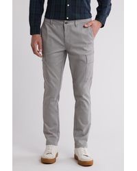 DKNY - Powerstretch Flat Front Cargo Pants - Lyst