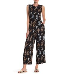 Angie Back Tie Cutout Floral Print Jumpsuit - Black