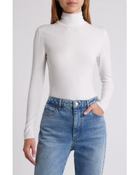 FRAME - Rib Mock Neck Top - Lyst