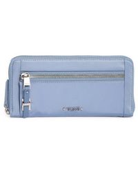 Tumi - Zip Around Continental Wallet - Lyst