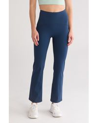Spanx - Booty Boost Flare Ankle Leggings - Lyst