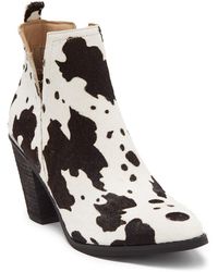 very volatile black boots