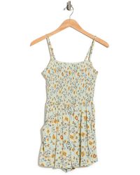 Angie Floral Smocked Sleeveless Romper In Lagoon At Nordstrom Rack - Multicolor