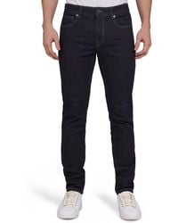 DKNY - Mercer Skinny Jeans - Lyst