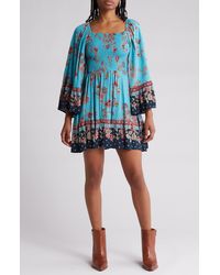Angie - Floral Print Smocked Bell Sleeve Dress - Lyst