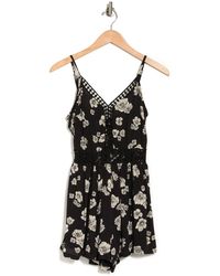 Angie Floral Print Lacey Romper In Black At Nordstrom Rack