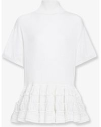 Alaïa - Peplum Virgin Wool Sweater - Lyst
