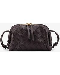 Bottega Veneta - Concert Leather Clutch With Intrecciato Motif - Lyst