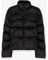 Balenciaga - Nylon Down Jacket With All-Over Lettering Logo - Lyst