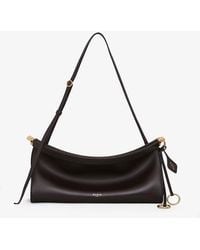 Alaïa - Le Click East West Medium Leather Crossbody Bag - Lyst