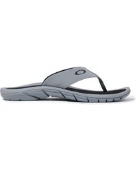 white oakley flip flops