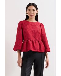 Phase Eight - Ellis Peplum 3/4 Sleeve Hem Top - Lyst