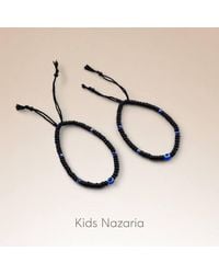 The Colourful Aura - 1 Pcs Adjustable Evil Eye Slim Beads Nazaria Bracelet For Kids & New Borns - Lyst