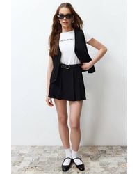 WOVCOR - Belted Mini Woven Skirt W/ Pleated Detail & Tailored Fit - Lyst