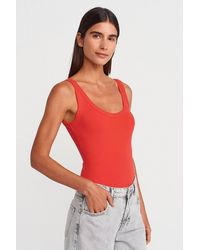Dilvin - Sleeveless Ribbed Cotton-Blend Bodysuit - Lyst