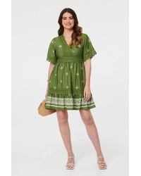 Izabel London - Border Print Lace 1/2 Sleeve Short Dress - Lyst
