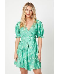 Oasis - Petite Trailing Floral Crepe Wrap Front Belted Mini Dress - Lyst