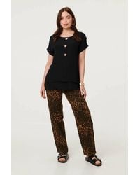 Izabel London - Layered Hem Short Sleeve Tunic Top - Lyst